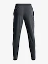 Męskie spodnie dresowe Under Armour  Storm STRETCH WOVEN PANT-GRY